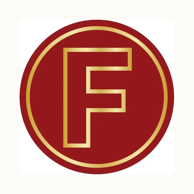 Das alte runde F-Logo in Rot mit goldenem Rand